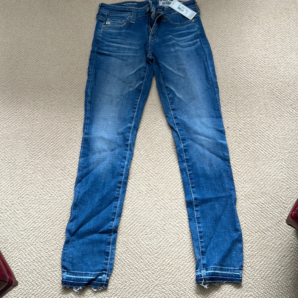 AG -ED denim NWT straight leg jeans with frayed hem. Size 25